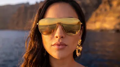 Woman with Gold Sunglasses by Water