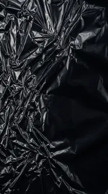Black metallic foil texture background